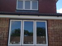PVCu windows black frames white casements in Fleet